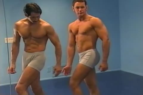 coach Teaching His fellow Flexing And Posing