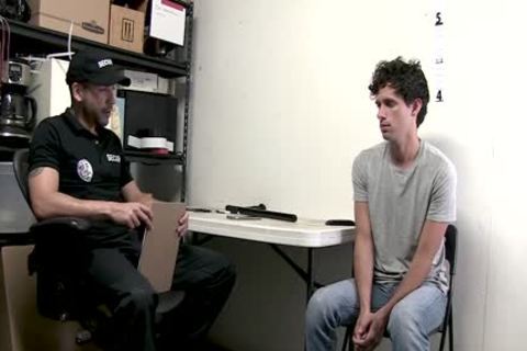 Security Guard Sticks A Billy Club In A Perps taut dark hole